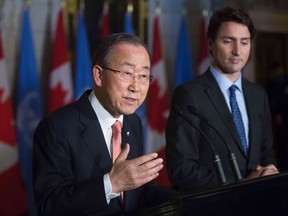 Prime Minister Stephen Harper, right, shakes hands with United Nations Secretary General Ban Ki-moon as they meet in Toronto on May 29, 2014. Justin Trudeau has criticized the former Conservative government for diminishing the country’s role at the UN. He will welcome Moon to Ottawa today.