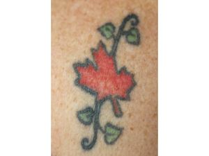 Closeup of tattoo. Conservative MP from B.C., Cathy McLeod, shows off her maple leaf just below her left shoulder. (Julie Oliver / Ottawa Citizen)