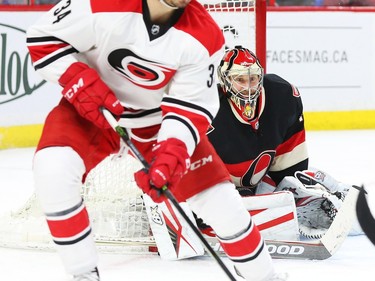 Craig Anderson of the Ottawa Senators defence against the Carolina Hurricanes during second period NHL action.