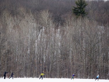 Cross-country skiers race in the 27 KM Classique.