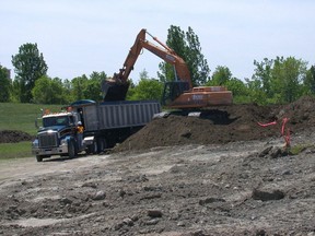 A file photo shows soil being removed at LeBreton Flats. An NCC spokesman said a large budget deficit in the last fiscal year had a lot to do with a $10-million contribution to the City of Gatineau for the Jacques Cartier Street refurbishment project, but the NCC also booked a $10.8-million accounting provision for contaminated land in the Bayview section of LeBreton Flats.