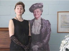 Farewell tea organizer Shirley Hockin poses with a likeness of the Dowager Countess of Grantham (Maggie Smith).