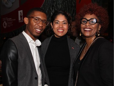 From left, Kressell Daniel from the High Commission for the Federation of Saint Kitts and Nevis, with Trinidad and Tobago's acting high commissioner, Venessa Ramhit-Ramroop, and Christobelle Reece from the Barbados High Commission, at On the Rocks: In the Caribbean, an annual Winterlude party hosted by the Ottawa Art Gallery at City Hall on Friday, February 5, 2016. (Caroline Phillips / Ottawa Citizen)