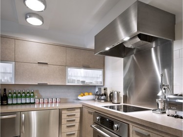 Tim Davis of Tim Davis Design Inc. installed a 'sort-of-commercial but not really range hood' in his own home because he loves its clean lines and quality of manufacture. The Ventaxia hood 'has a nice restaurant feel to it.’