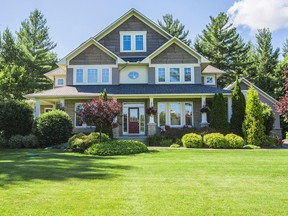 Set on almost four acres, this rural Kanata property has four bedrooms.