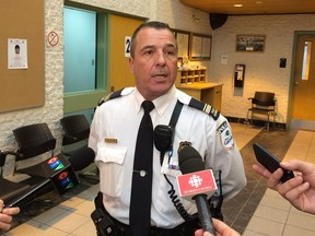 Gatineau police Lt. Jean-François Beauchamp speaks to reporters on Saturday about a mysterious incident in which a man was found beaten inside an Aylmer home.
