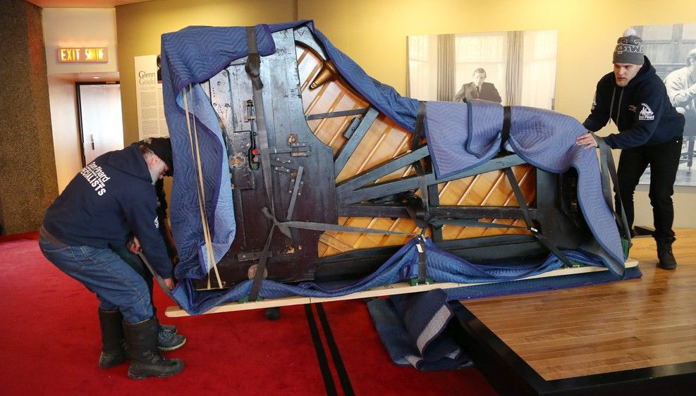 Glenn Gould's famous Steinway piano is moved out of the NAC to its new home at the Canadian of Nature Museum, February 11, 2016. Photo by Jean Levac