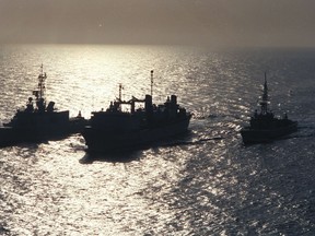 Canadian Task Group sailing in the Persian Gulf. Left to right: HMCS Athabaskan, HMCS Protecteur and HMCS Terra Nova.