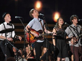 The Lumineers, from left, Jeremiah Fraites, Wesley Schultz, Neyla Pekarek and Stelth Ulvang perform at the 55th annual Grammy Awards on Sunday, Feb. 10, 2013, in Los Angeles. The Lumineers, the Denver-based folk-rock band who authored the rousing smash single "Ho Hey," and who have played sparingly in Canada, will play Bluesfest Saturday, July 9.