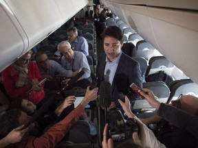 Prime Minister Justin Trudeau speaks to reporters.