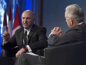 Kevin O'Leary speaks with Preston Manning during a session entitled "If I run here's how i'd do it" during a conservative conference in Ottawa Friday, February 26, 2016.