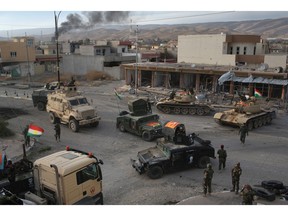Peshmerga forces take positions on November 15, 2015 in Sinjar, Iraq. Kurdish forces, with the aid of massive U.S.-led coalition airstrikes, liberated the town from ISIL extremists.