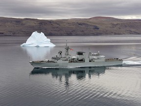 HMCS Montreal passes an iceberg in Strathcona Sound near Nanisivik, Nunavut Territory, during Operation NANOOK.