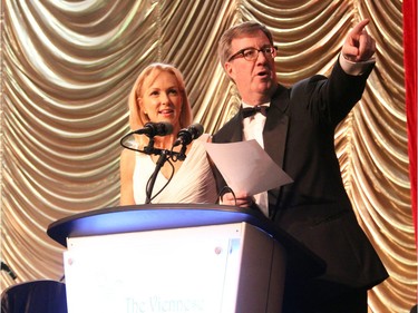Mayor Jim Watson, with help from Blair Dickerson, auctioned off a VIA Rail trip and a private dinner with the Austrian ambassador at the 19th edition of the Viennese Winter Ball, held at The Westin hotel on Saturday, February 20, 2016.