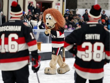 Spartacat checked out the puck before the big game started.