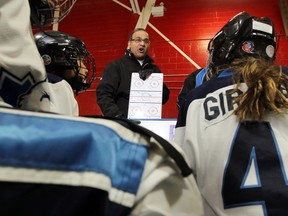 Nalin Bhargava, president of the Ottawa Girl's Hockey Association, gives a pep-talk to the team he co-coaches at Brian Kilrea Arena. Bhargava is unhappy with the inequality between the amount of ice time given to boys versus girls hockey.