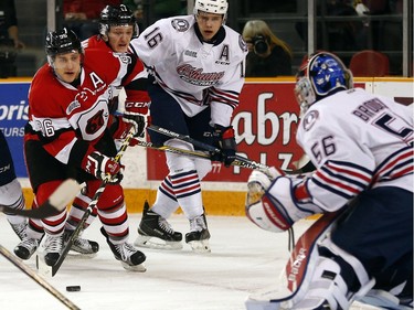 Ottawa 67s' Dante Salituro (96) looks to shoot on Oshawa Generals' goaile, Jeremy Brodeur (56) during the first period.