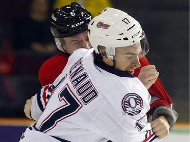 Ottawa 67s' Ryan Orban (6) and Oshawa Generals' Alexandre Renaud (17) fight during the first period.