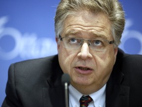 Ottawa City Manager Kent Kirkpatrick answers questions from the media after the city's 2016 draft budget in Ottawa City Hall council chambers Thursday November 12, 2015. (Darren Brown/Ottawa Citizen)