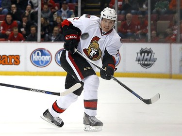 Ottawa Senators defenseman Dion Phaneuf (2) passes the puck against the Detroit Red Wings in the first period.