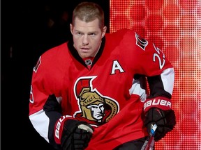 Chris Neil, seen in a file photo, is playing in his 950th game as an Ottawa Senator on Saturday, Feb. 13, 2016. 'I’ve always put the logo on the front ahead of the namebar on the back,' he said.