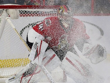 Senators goalie Craig Anderson tries to see through a snow storm during second period action.