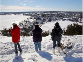 Photographers capture views of Westport from the lookout at Foley Mountain Conservation Area.