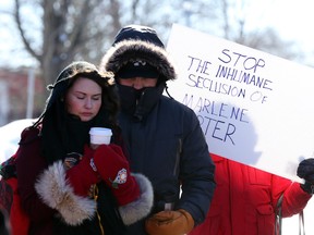 Demonstrators gathered in frigid temperatures outside the Royal Ottawa to protest the treatment of a native woman.