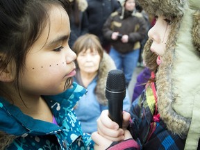 Samantha Kigutaq-Metcalfe, 12 and Cailyn Degrandpre, 11 were throat singing at the Inuit Day celebrations Saturday February 20, 2016 at the Ottawa Inuit Children's Centre.