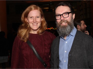 Sarah Fuller, a Master of Fine Arts student at the University of Ottawa, and Ottawa artist Danny Hussey attended On the  Rocks: In the Caribbean, an annual Winterlude party hosted by the Ottawa Art Gallery at City Hall on Friday, February 5, 2016. (Caroline Phillips / Ottawa Citizen)