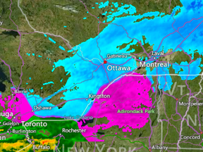 Environment Canada Radar at 6:45 ET shows very heavy rain south of Ottawa in pink, and snow in the Ottawa area in blue.