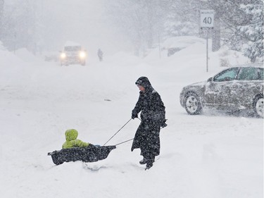 Sledding was a good way to move around on Harmer Avenue South.