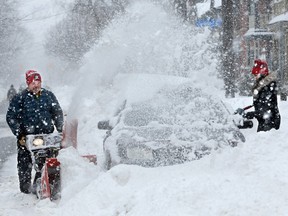 A snowed-in car, a day after a record snowfall blanketed Ottawa on Feb. 16, 2016.