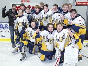 The Perth Lanark bantam B1 team capped an undefeated regular season with a 6-3 win over Richmond at the Lanark and District Community Centre on Monday, Feb. 08, 2016. In back, from left, are Joe Kilpatrick (trainer), Philippe Gauthier, Connor Greaves, Austin Topping, Kobe Echlin, Kurt Greaves (assistant coach), Blair Coleman, Ben Kilpatrick, Ethan Paisley, Chad Graboski (assistant coach) and Will Laidlaw. In front, are Callum Anderson, Kade Liko and Hayden. Head coach Colin Anderson was missing from the photo.