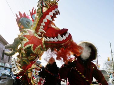The Somerset Street Cinatown Business Improvement Area holds its annual lion dance parade in partnership with the National Capital Commission and the 2016 Winterlude as it makes its way along Somerset St. Sunday February 14, 2016.