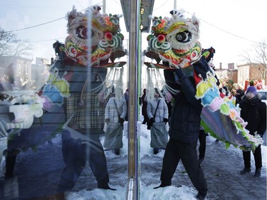 The Somerset Street Cinatown Business Improvement Area holds its annual lion dance parade in partnership with the National Capital Commission and the 2016 Winterlude as it makes its way along Somerset St. Sunday February 14, 2016.