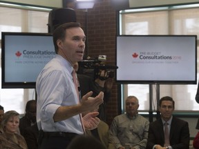 Minister of Finance Bill Morneau participates in a town hall meeting ahead of pre-budget consultations in Ottawa, Monday February 22, 2016.