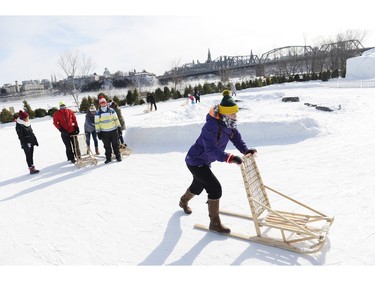 Winterlude attendees enjoy the kicksled ride at Jacques Cartier park on Saturday Feb. 13, 2016.