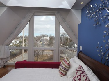 A small treed park off the master bedroom allows for great views of the canal and the rooftops of Old Ottawa East.