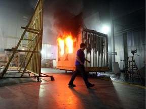 Researchers conduct a burn test at the National Research Council fire lab in Mississippi Mills.