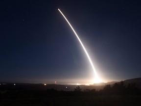 In this Saturday, Feb. 20, 2016 file photo provided by U.S. Air Force, an unarmed Minuteman III intercontinental ballistic missile launches during an operational test at Vandenberg Air Force Base, Calif.