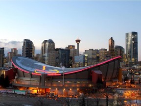 Skyline photo of Calgary, AB January 25, 2012 with the Scotiabank Saddledome in the foreground.The Saddledome, home of the Calgary Flames (NHL), Calgary Hitmen (WHL) and Calgary Roughnecks (National Lacrosse League) was built for the 1988 Winter Olympics. JIM WELLS/CALGARY SUN/QMI AGENCY