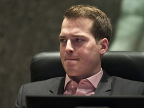 Mathieu Fleury at the council table in Ottawa City Hall, where he's staying.