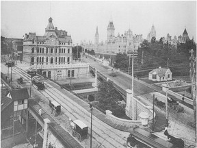 The post office and Parliament buildings are pictured with the Sappers and Dufferin bridges in the foreground. Photo from 1898.