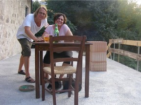 Jake Rupert and Lisa Grassi-Blais enjoy the partially finished terrace.
