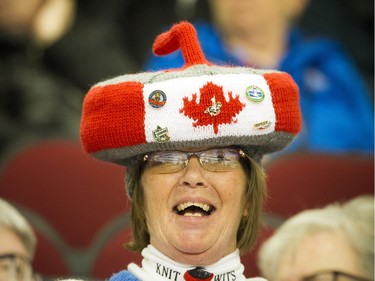 A woman in the crowd at the gold medal game at the Tim Hortons Brier held at TD Place Arena Sunday March 13, 2016.