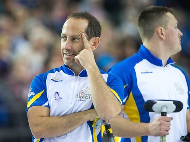 Alberta player Brent Laing pauses before the next shot against PEI as the Tim Horton's Brier continues on Sunday at TD Place in Ottawa.