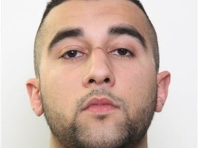An Edmonton police hand-out photo of Arman Dhillon, 21, who is wanted on a Canada-wide warrant in connection to a fatal shooting at a Whyte Avenue bar last weekend.