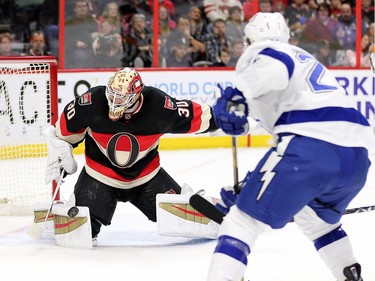 Andrew Hammond makes a stop on Ryan Callahan in the second period as the Ottawa Senators take on the Tampa Bay Lightning in NHL action at the Canadian Tire Centre in Ottawa.