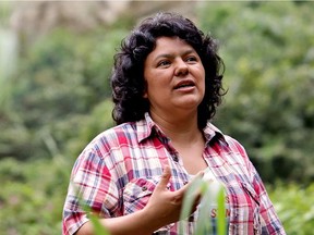 In this Jan. 27, 2015 photo released by The Goldman Environmental Prize, Berta Caceres speaks to people near the Gualcarque river located in the Intibuca department of Honduras.